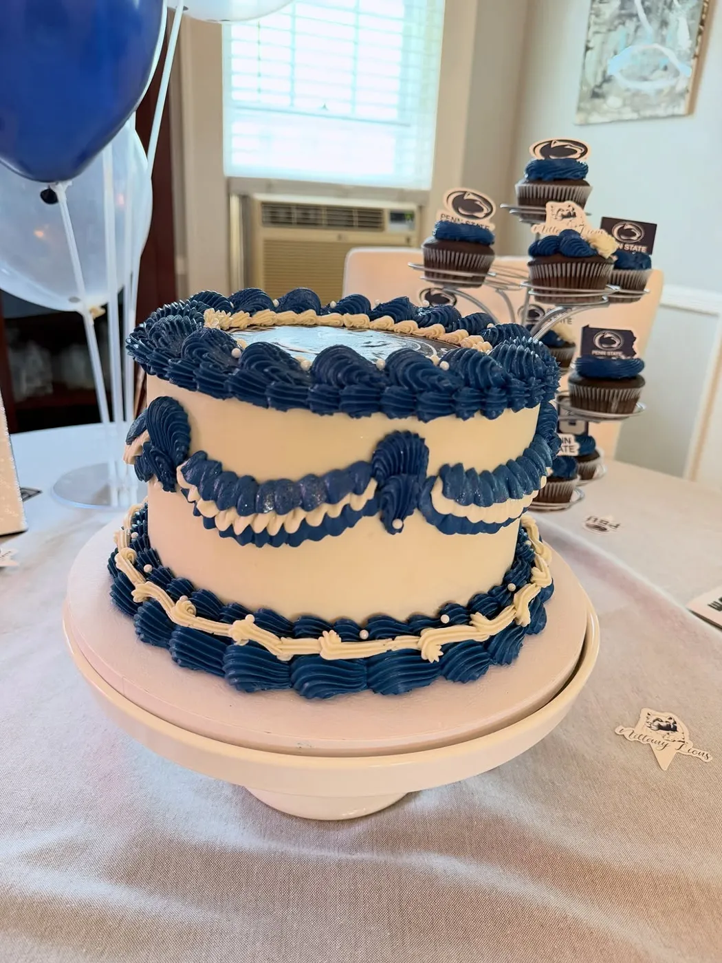 Cream cake with navy vintage piping